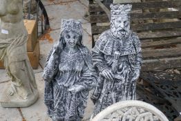 A pair of garden statues of King and Queen