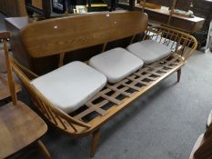 Ercol, a light Elm Studio settee, (minus seat cushions) 206cms