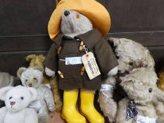 A Paddington Bear with yellow hat & boots