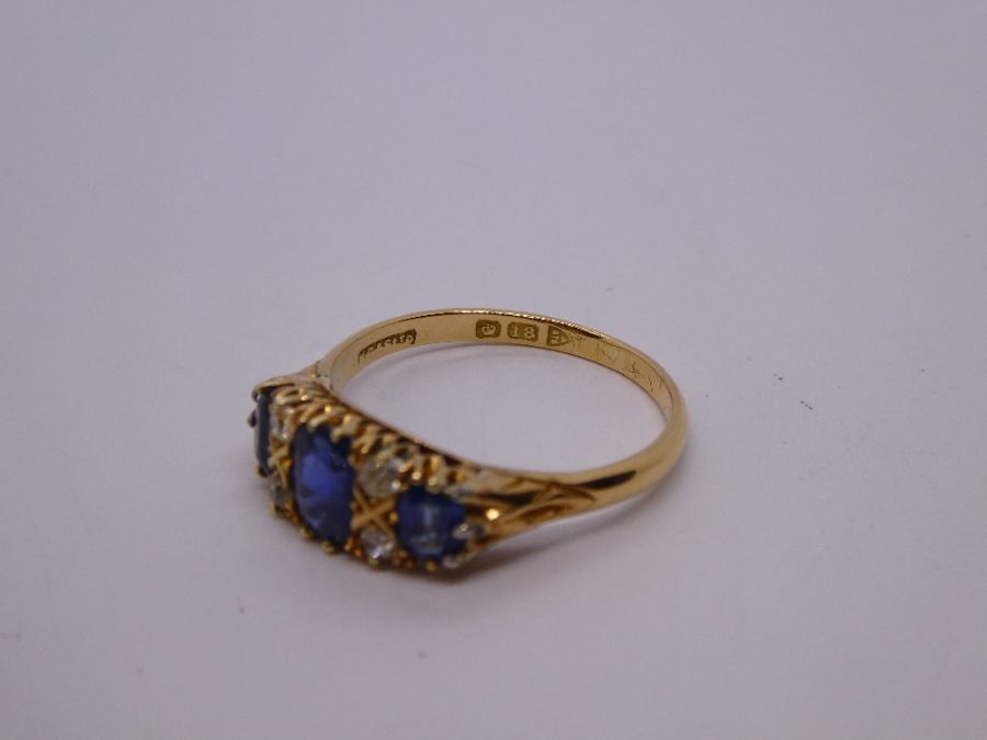 Antique Sapphire and diamond ring with central oval blue sapphire flanked diamonds and smaller oval - Image 7 of 11