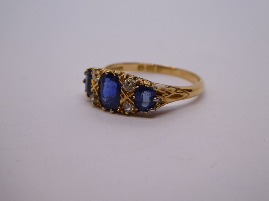 Antique Sapphire and diamond ring with central oval blue sapphire flanked diamonds and smaller oval - Image 10 of 11