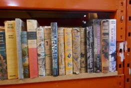 A selection of books, including Dennis Wheatley and Arthur Ransome examples