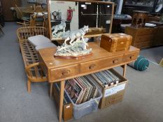 Ercol, an elm dressing table having three drawers, 114cms