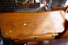 A rustic coffee table, and a pine blanket box