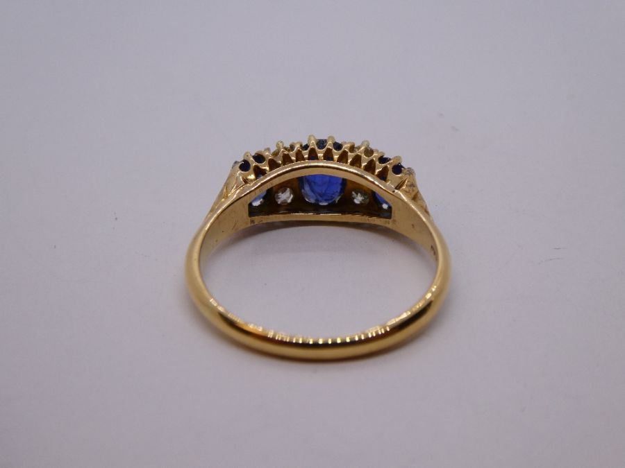 Antique Sapphire and diamond ring with central oval blue sapphire flanked diamonds and smaller oval - Image 8 of 11