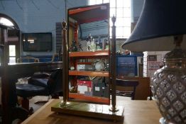 A gilt dressing mirror and a modern silvered table lamp