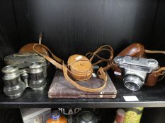 A WWI military pocket compass in leather case, a vintage camera and sundry