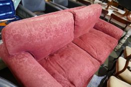 A Multi York sofa, having maroon loose covers