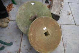 Two old grinding stones
