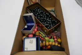 Box of mixed costume jewellery to include black glass beads and other examples