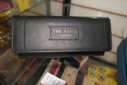 A pair of Ted Baker sunglasses, in hard case