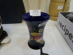 A small Moorcroft vase decorated flowers, 11cm