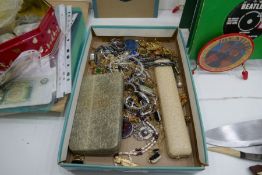A small tray of costume jewellery