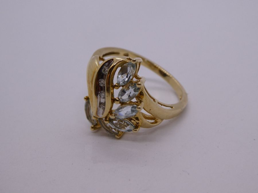 Fancy 9ct yellow gold aquamarine and diamond dress ring, size N, 2.7g approx, mark illegible