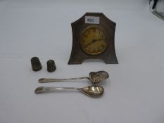 A silver desk clock of engine turned design with stand, hallmarked Birmingham 1923. 10cm x 8cm appro