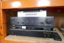 A Marantz compact disc player, other audio unit and a pair of Wharfedale speakers
