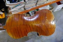An old Violin in green Rexine case