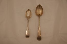 A silver Victorian dessert spoon hallmarked London 1842, John and Henry Lias. Also with a heavy silv