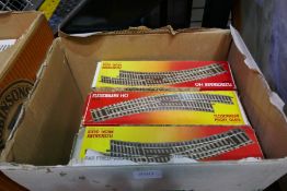 Large quantity of boxed HO Gauge track by Fleishmann, including some long straights
