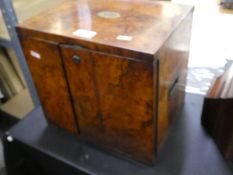 A Victorian Burr walnut miniature cupboard with enclosed drawers, 30cm