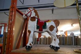 An old Mobo bronco child's horse, repainted