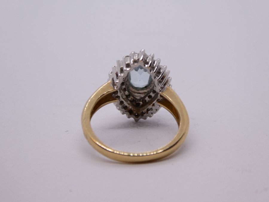 Contemporary 9ct gold aquamarine and diamond cluster ring in a marquise shaped mount, central oval a - Image 5 of 6