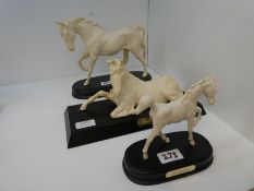 A Royal Doulton figure of lying horse, titled "Spirit of Peace", a "Spirit of Freedom" horse figure,