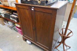 A mahogany two door cupboard and a modern bentwood style hatstand