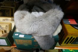 A tray of faux fur items and sundry