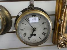 An old brass bulkhead clock