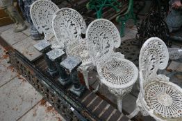 A set of four Victorian style aluminium garden chairs