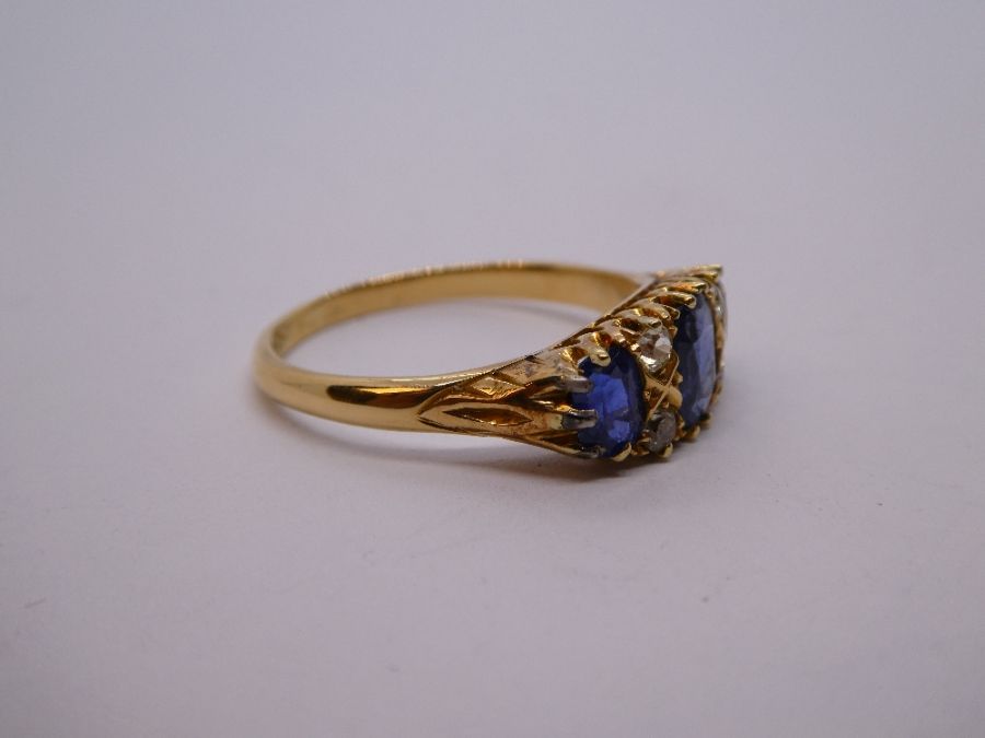 Antique Sapphire and diamond ring with central oval blue sapphire flanked diamonds and smaller oval - Image 11 of 11