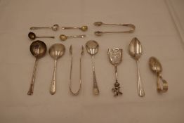 A quantity of silver flatware to include a silver Victorian windmill spoon Sheffield 1900 with the i