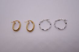 Pair of 9ct white gold wavy hoop earrings, marked 9ct, approx 1.1g together with a pair of 18ct yell