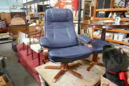 A Stressless style blue leather chair, with matching stool