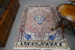 A pink ground Hamadan rug having floral design, 190 x 133cms