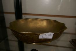 A Chinese brass oval bowl decorated birds and flowers and other items