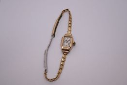 Vintage 9ct gold case Nivada wristwatch AF (no glass) marked on a rolled gold strap