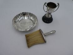 A silver trophy cup on base with engraving on the face. Birmingham, Walker and Hall 1926. Also with