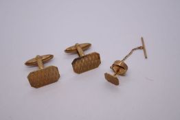 Pair of 9ct yellow gold gents cufflinks with allover geometric design and matching shirt stud on cha