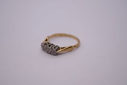 Yellow gold illusion set diamond trilogy ring, size N/M, 2.6g approx, marks worn