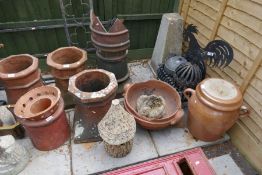 Various garden items, including chimney pots