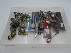 A quantity of souvenir spoons, some boxed, also with some silver flatware, some foreign, silver plat