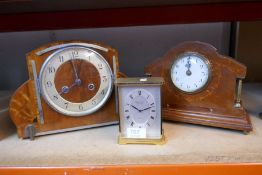 A carriage clock by Garrard and two other mantel clocks