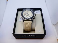 A boxed as new Bulova Marine Star watch with nice colour strap