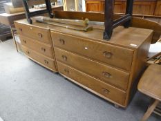 Ercol, a pair of elm chests, each having three long drawers, 91cms