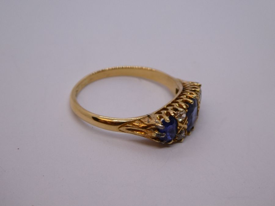 Antique Sapphire and diamond ring with central oval blue sapphire flanked diamonds and smaller oval - Image 6 of 11