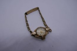 Vintage 9ct yellow gold cased ladies Avia wristwatch on plated strap, inscription to reverse EC, 5-9