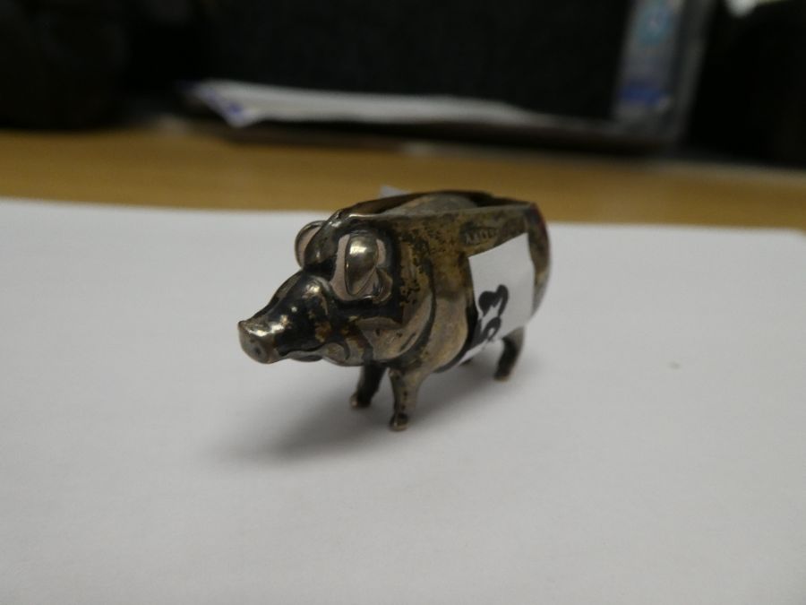 An Edwardian novelty silver pin cushion in the form of a little pig, hallmarked Birmingham 1906, Adi