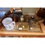 A selection of various brass collectables including bells, tea caddy and tobacco tin, etc